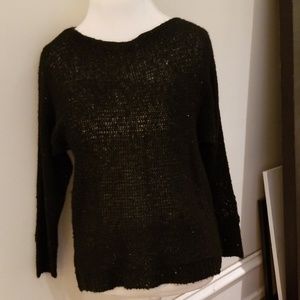 Black sparkly sweater. Perfect for holidays